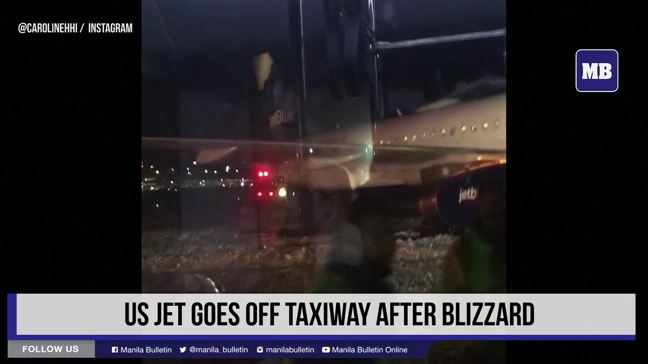 US jet goes off taxiway after blizzard