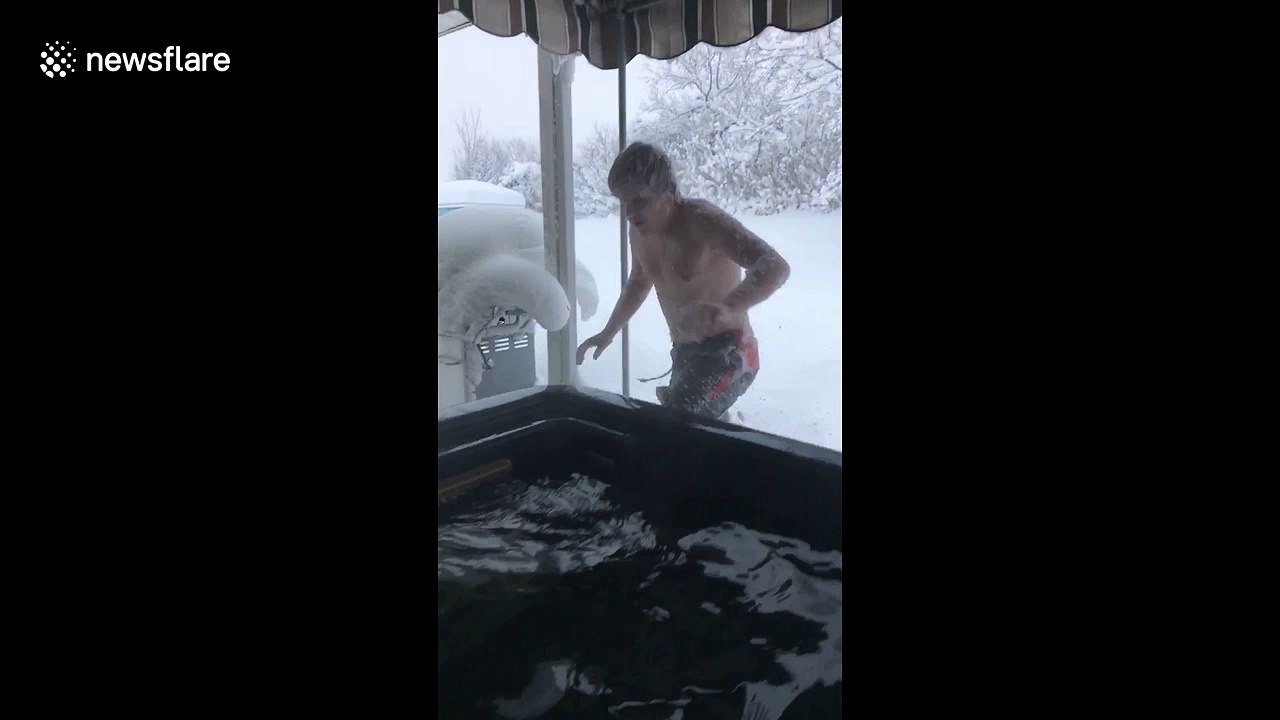 Boy dives into feet of snow in Erie, Pennsylvania