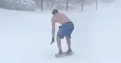 Topless Erie Man Goes Skimboarding After Record Snowfall