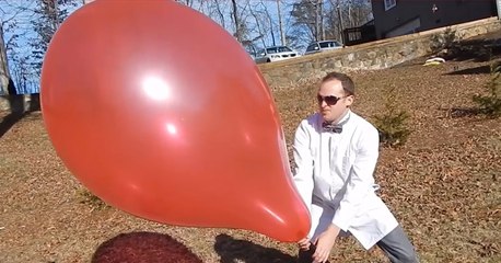 Giant Balloon Pops In Slow Motion!
