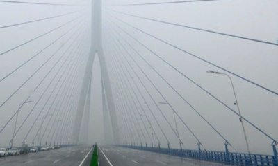 Tiongkok Buka Jembatan Terlebar Untuk Rute Truk