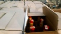 Polisten yılbaşı öncesi sahte içki baskını... 9 bin 293 şişe sahte içki ve üretim yapılan malzemeler ele geçirildi