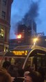 Firefighters Tackle Blaze at Manchester Apartment Building