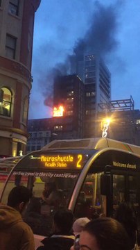 Firefighters Tackle Blaze at Manchester Apartment Building