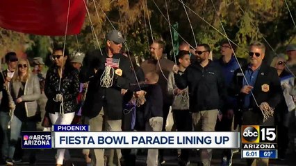 Fans attend Fiesta Bowl parade in Phoenix