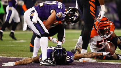 Joe Flacco splits two defenders with a touchdown dart to Chris Moore