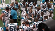 Cam Newton gathers offense on the sideline to get them fired up