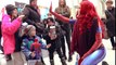 Spider-Man  SPIDER-VERSE CHRISTMAS FLASH MOB!!! Giving Gifts Prank | Superheroes | Spiderman | Superman | Frozen Elsa | Joker