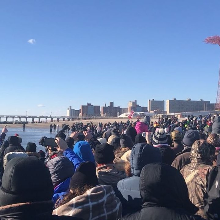 Beachgoers Dash Into Coney Island Water for Pol...