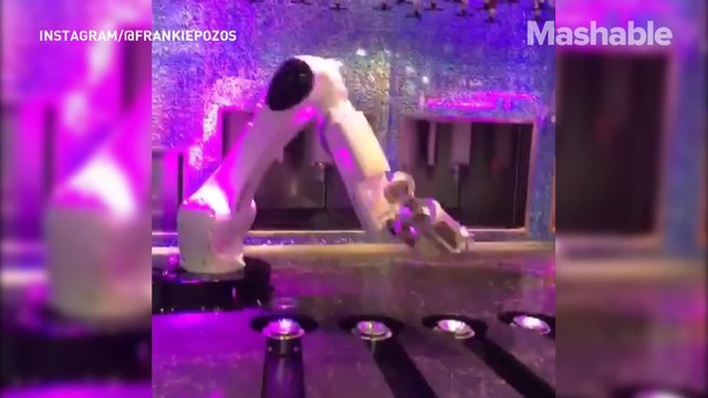 These robotic arms are actually bartenders