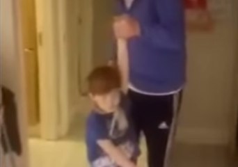 Kid Hasn't Quite Got the Hang of His Christmas Gift of Roller Skates