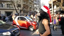 Masked Santa blocks traffic dancing on New Year's Eve