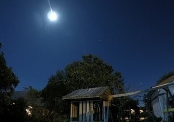Rising Supermoon and Fireworks Bring in New Year's at Cocoa Beach
