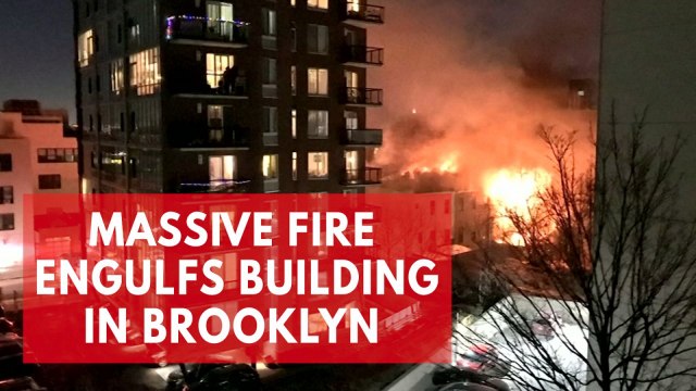 Massive fire engulfs residential building in New York