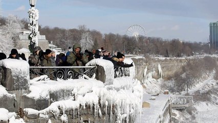Niagara Falls partially frozen over in North American cold snap