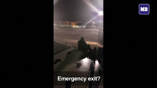 Tired of waiting, Ryanair passenger gets out and sits on wing