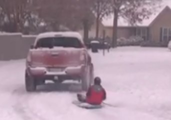 Body Board Converted to Sled as Cold Streak Continues in South Carolina