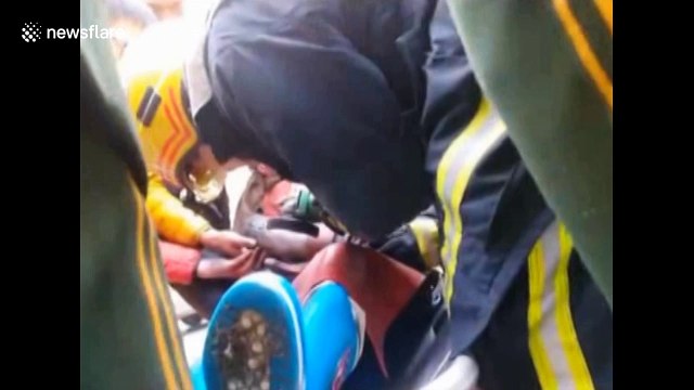 Firefighters rescue woman with hand stuck in meat grinder