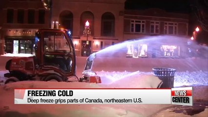 North America in deep freeze as Australia nearly breaks heat record