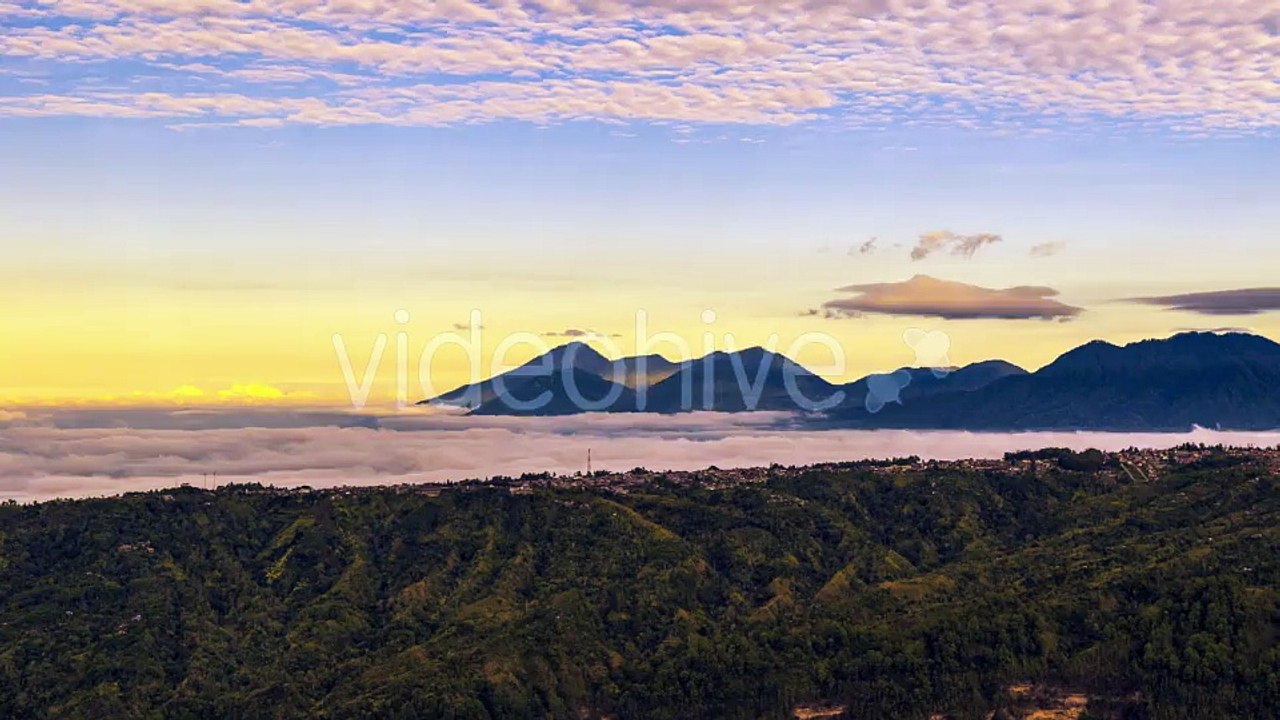 Panorama Of The Mountains Covered With Clouds in Bali, Indonesia by Timelapse4K