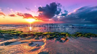 Sunset In Ocean On The Balangan Beach Volcanic Bowls in Bali by Timelapse4K