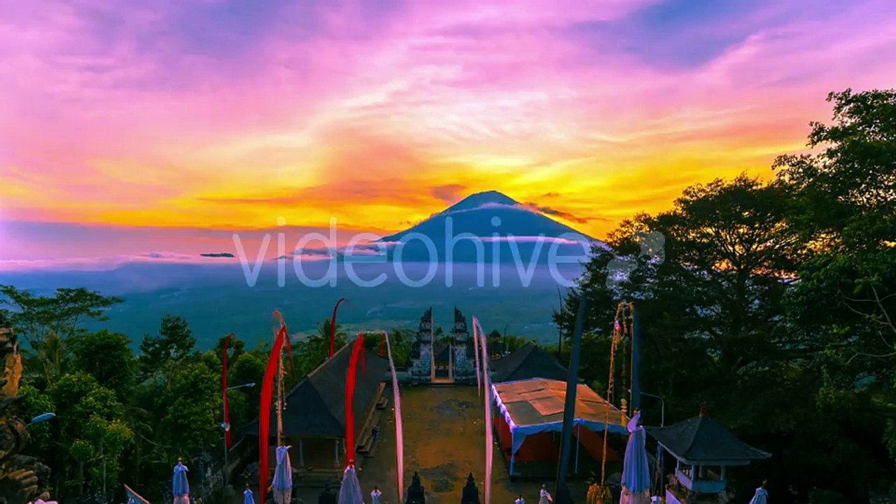 Sunset On The Background Volcano Gunung Agung in Bali, Indonesia by Timelapse4K