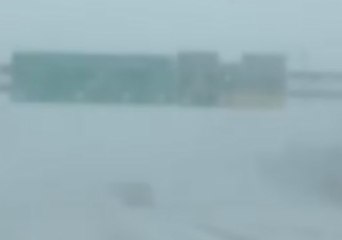 Driver Navigates Through Whiteout Conditions on New York City Highway