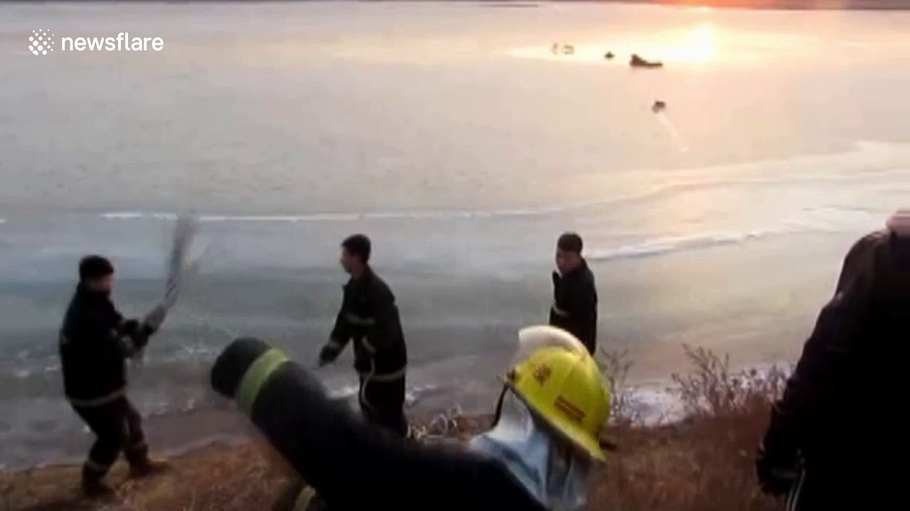Firefighters rescue elderly man trapped on frozen river