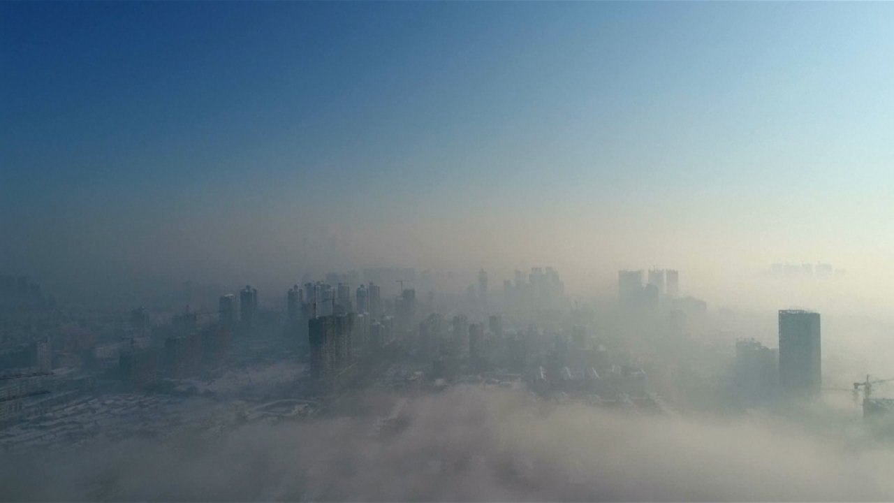 A dense fog makes Chinese city look eerie and mysterious