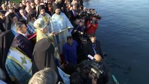 Orthodox Christians in swimming race for Epiphany