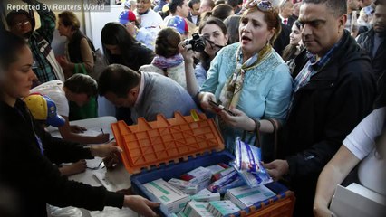 Caracas Shops Mobbed As Venezuela's Maduro Forces Price Cuts