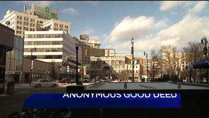 Anonymous Donor Ties Bags of Gloves, Hats to Trees for People in Need