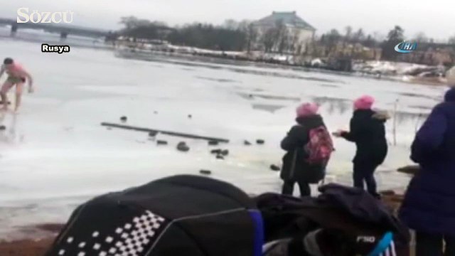Donmuş göldeki köpeği kurtardı