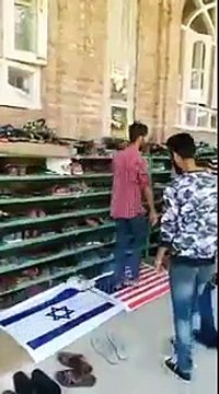 Moslems Step On Israeli And American Flags