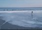 Man's Ice Skating Escapade on Frozen Maine Beach Captured on Video