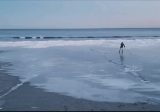 Man's Ice Skating Escapade on Frozen Maine Beach Captured on Video