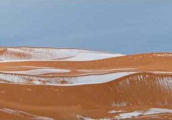 Snow Whitens Sahara Desert in Algeria