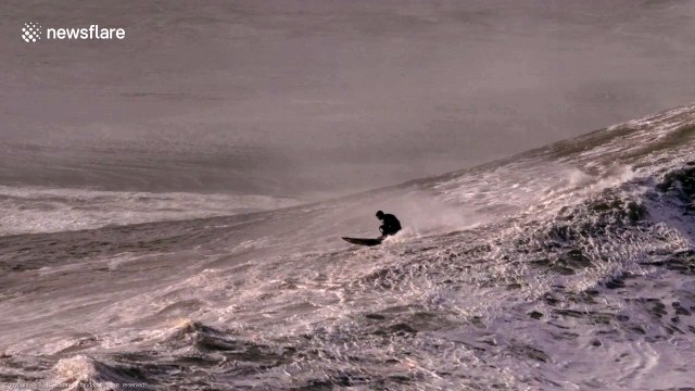 Surfer rides spectacular giant wave in Portugal's Nazaré