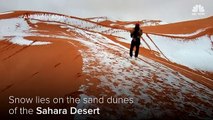 Snow lies on Sahara Desert dunes near Ain Sefra, Algeria