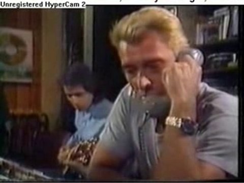Johnny hallyday parle au téléphone avec Michel Bergers ( Je t'attends 1986 )