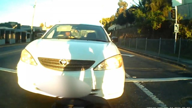 Motorist tries to pay cyclist he just rammed with his car