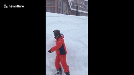 Skier creates 'mini-avalanche' in French Alps snow embankment