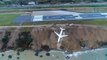 Turkish plane skids off runway on to steep slope