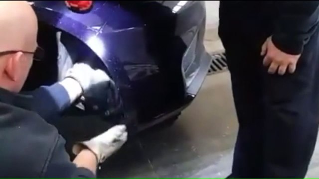 Firefighter Rescues Cat from Wheel Well of Car
