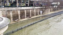 Chuvas fazem rio Sena transbordar