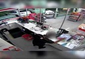 Armed Robbers Smash Through Service Station Doors