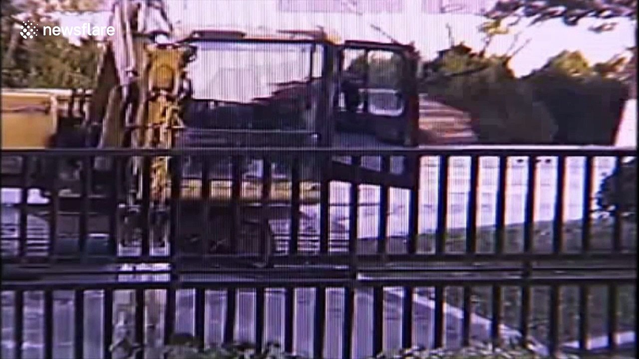 Schoolboy hijacks digger, knocks down iron gate