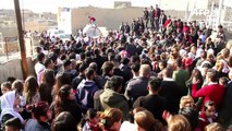 Iraqi Yazidis celebrate restoration of temple destroyed by IS