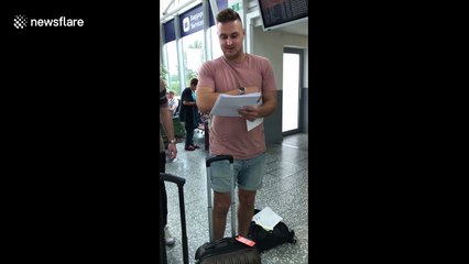 UK football team plays giant boarding pass prank on player