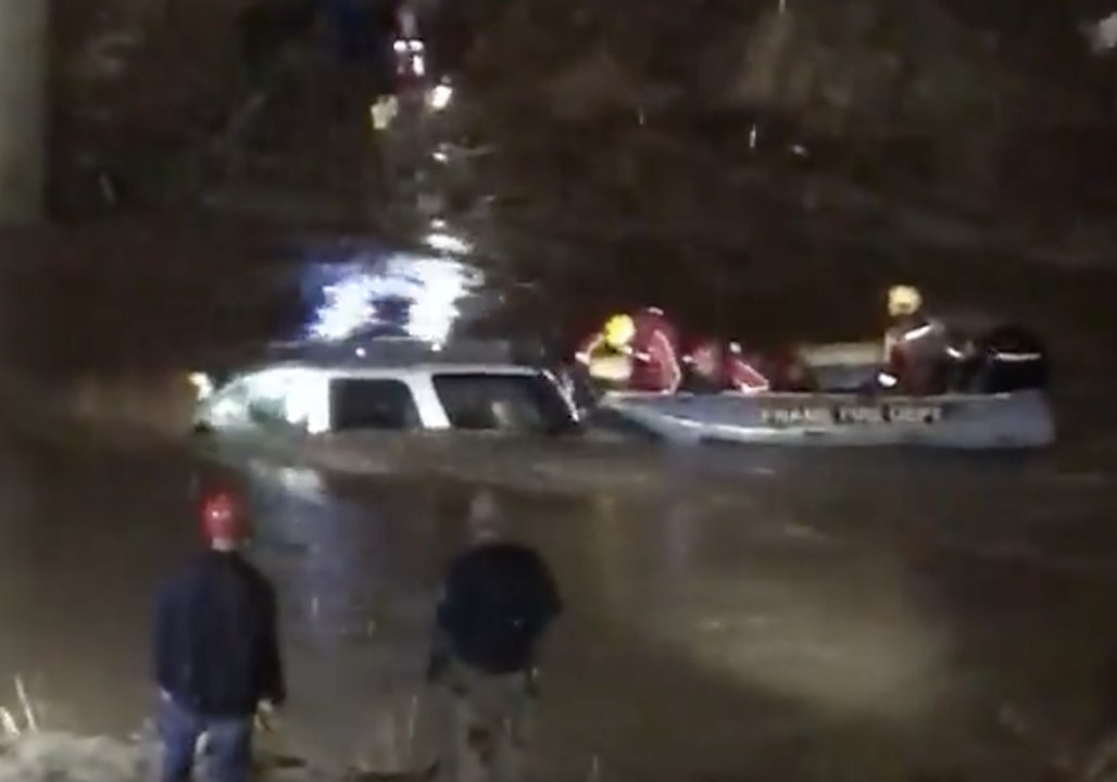 Elkview Firefighters Pull Man From Vehicle Submerged in Floodwater